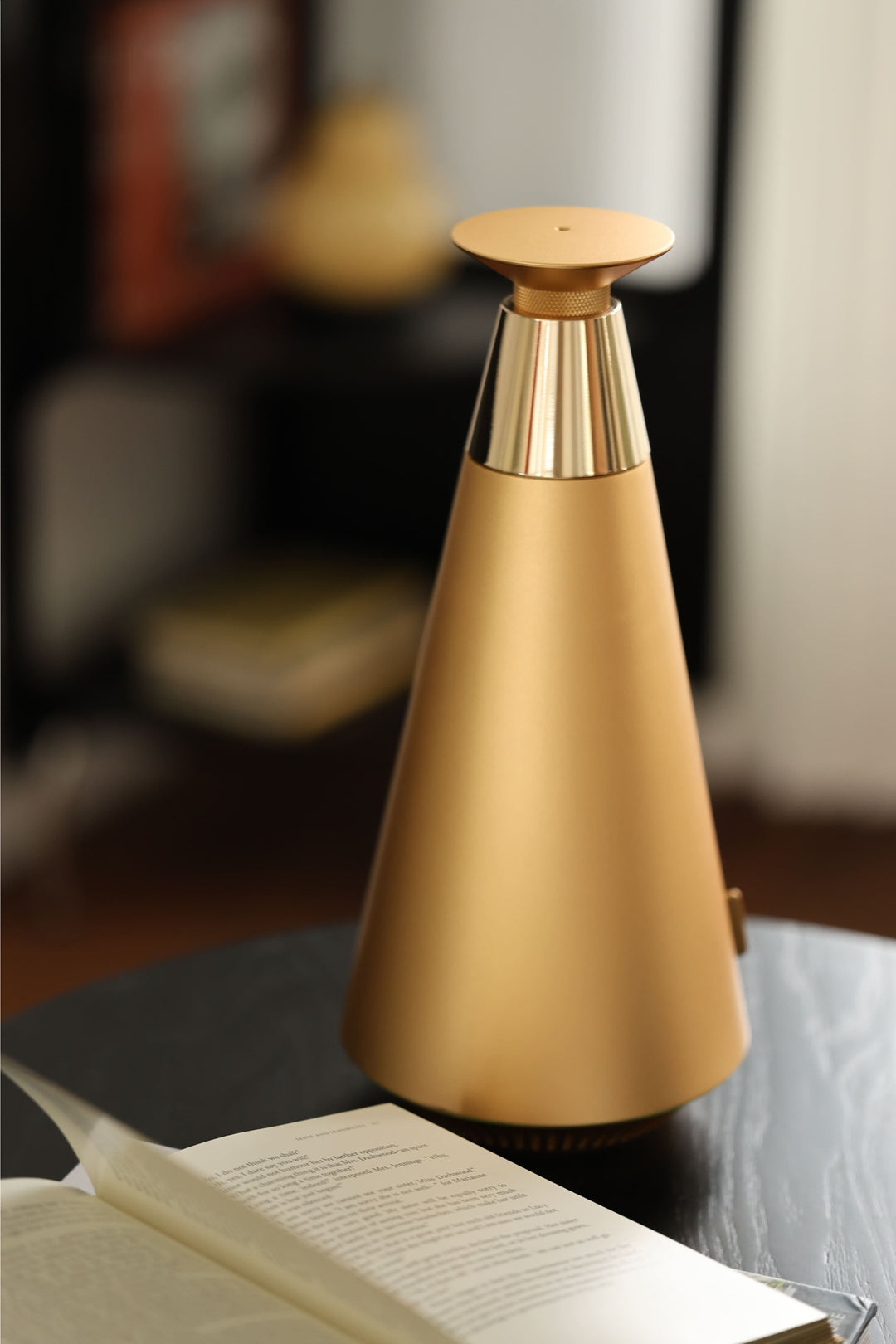 NASS Eclat scent diffuser - gold on a side table