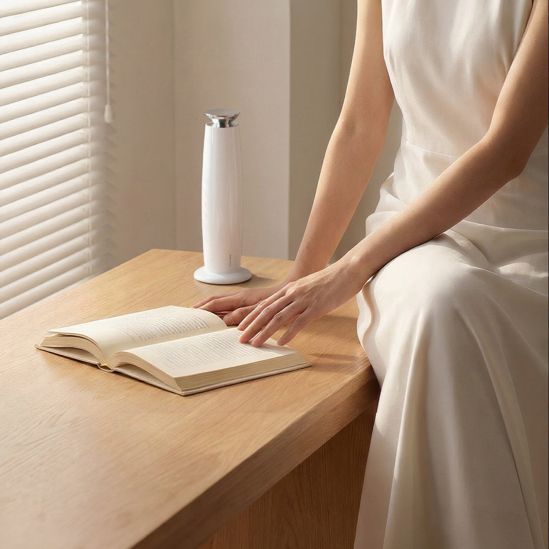 NASS Grace scent diffuser - white on a reading table