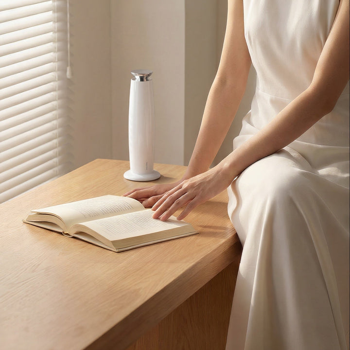 NASS Grace scent diffuser - white on a reading table