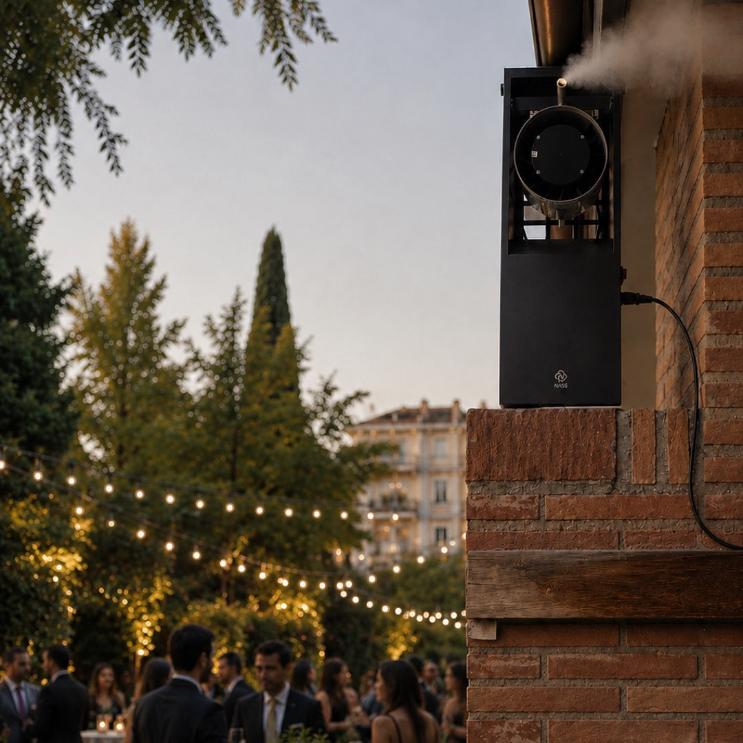 NASS Titan outdoor scent diffuser mounted on a garden wall