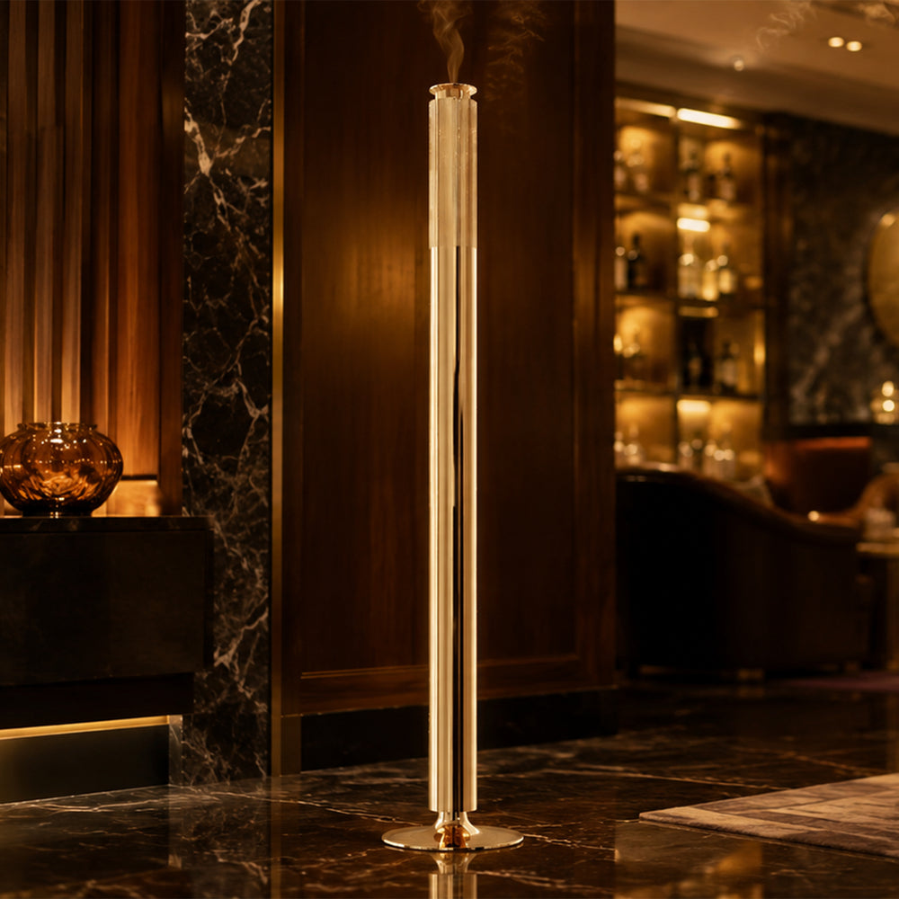 NASS Vertex Tower scent diffuser in gold in a lounge